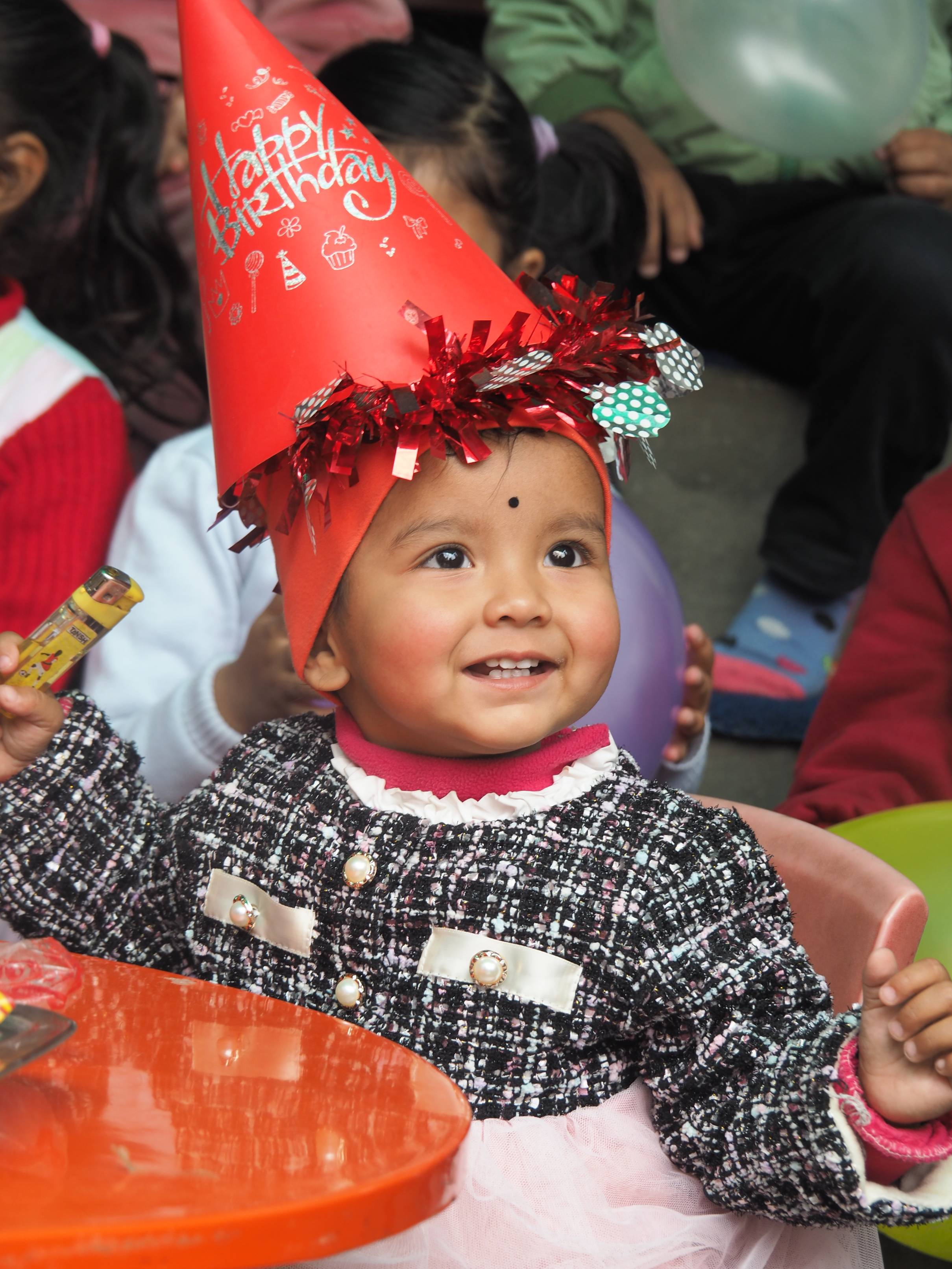 Happy children learning together in classroom